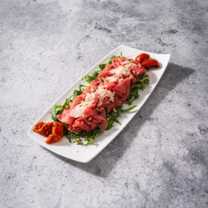 Bordje rundscarpaccio van wit blauw rund